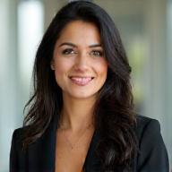Headshot of Aisha Khan, Founder and Lead Strategist at ArtSpeak Media.
